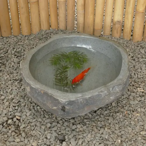 Product image of the product “Water basin made of river stone. Model 3, approx. 34 x 38 x 15 cm height. ”